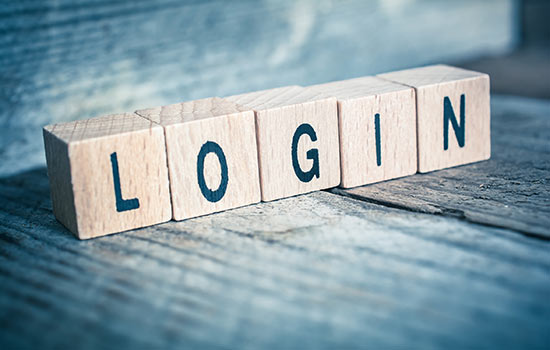 ©devenorr - stock.adobe.com Holzblöcke auf denen die Buchstarben für den Schriftzug Login sichtbar sind.